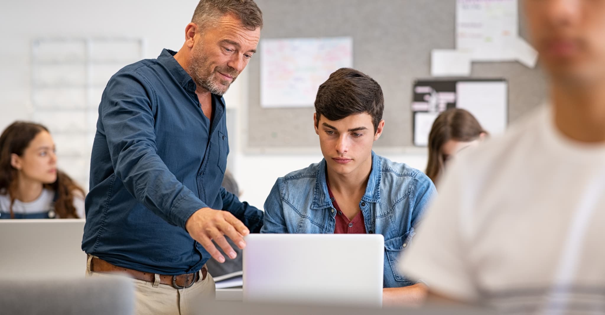 MBA educator and students in classroom setting