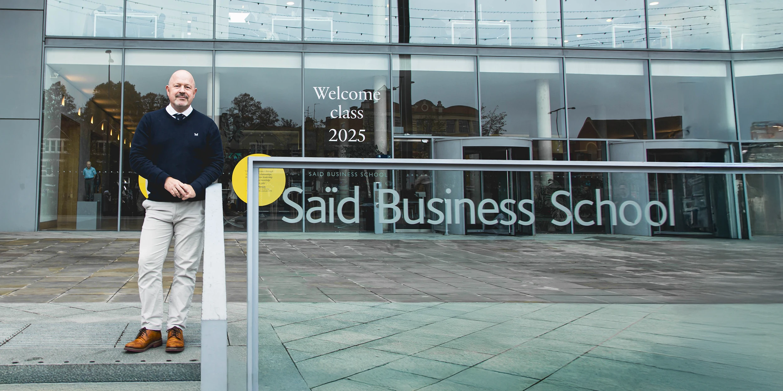 Mark Bramwell standing outside of Saïd Business School
