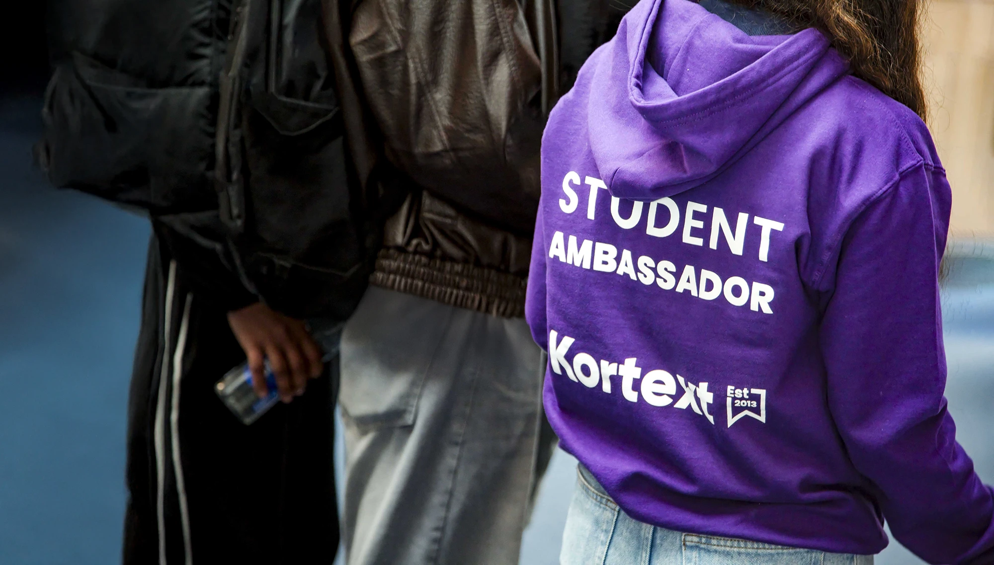 Back of a purple Kortext Student Ambassador hoodie