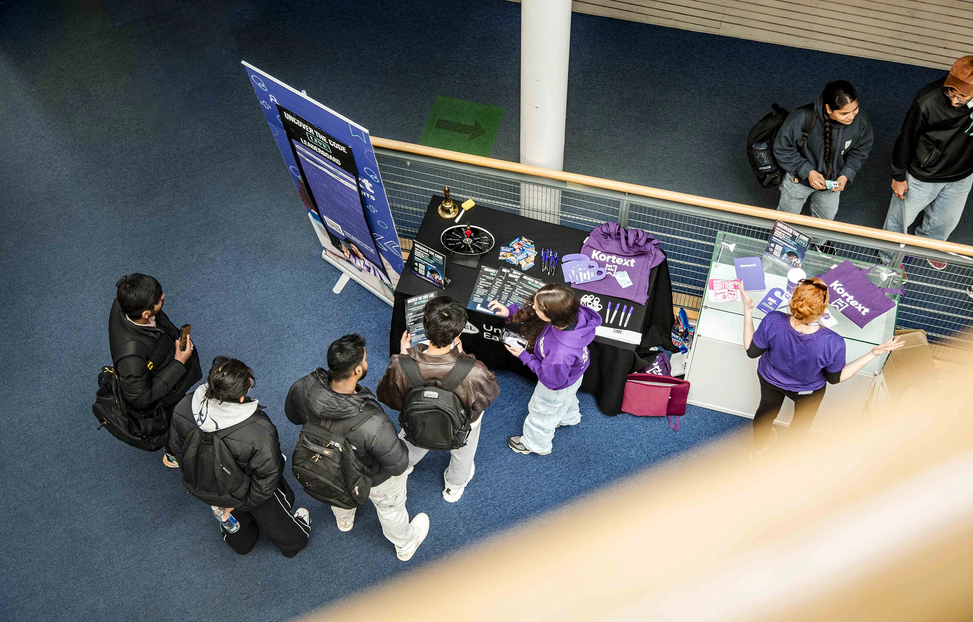 Aerial view of students gathered at a Kortext UEL event stand