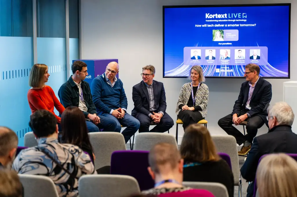 panel of speakers on stage at kortext live 2025