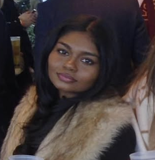 A student ambassador taking a selfie at university