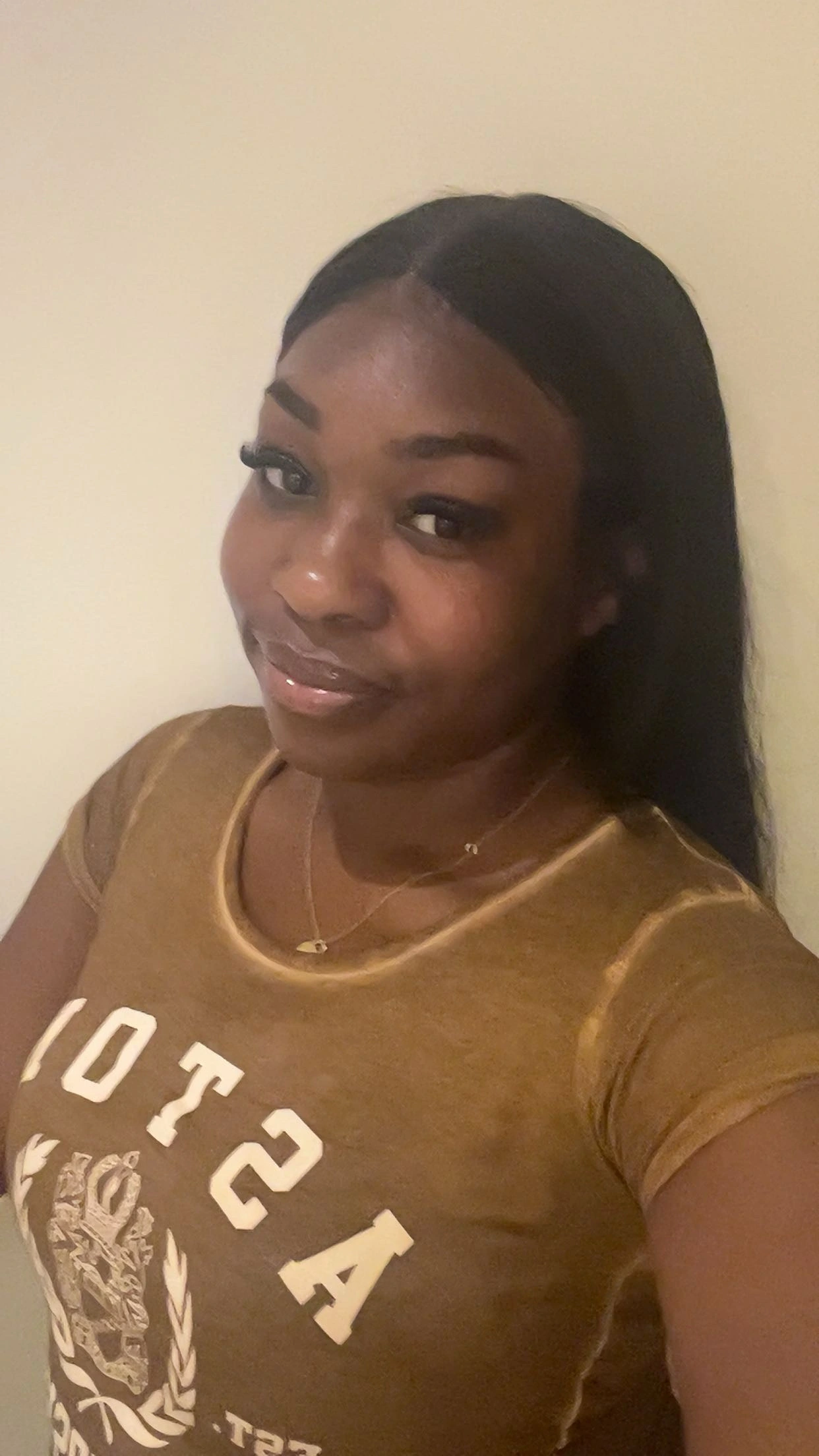 A student ambassador taking a selfie at university