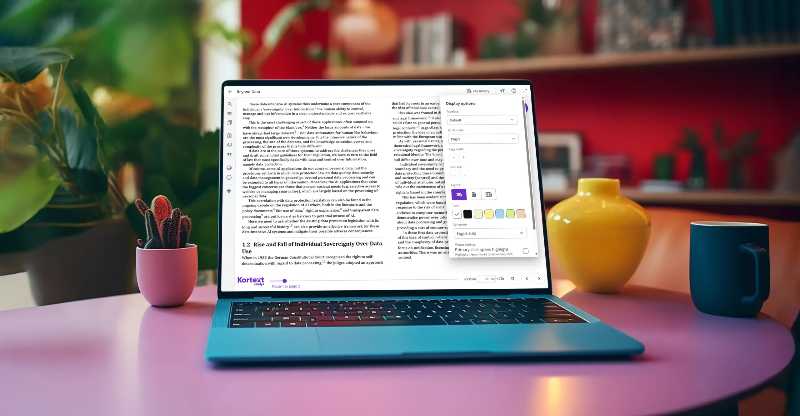 A laptop shows Kortext's display options menu for customising your eBook.