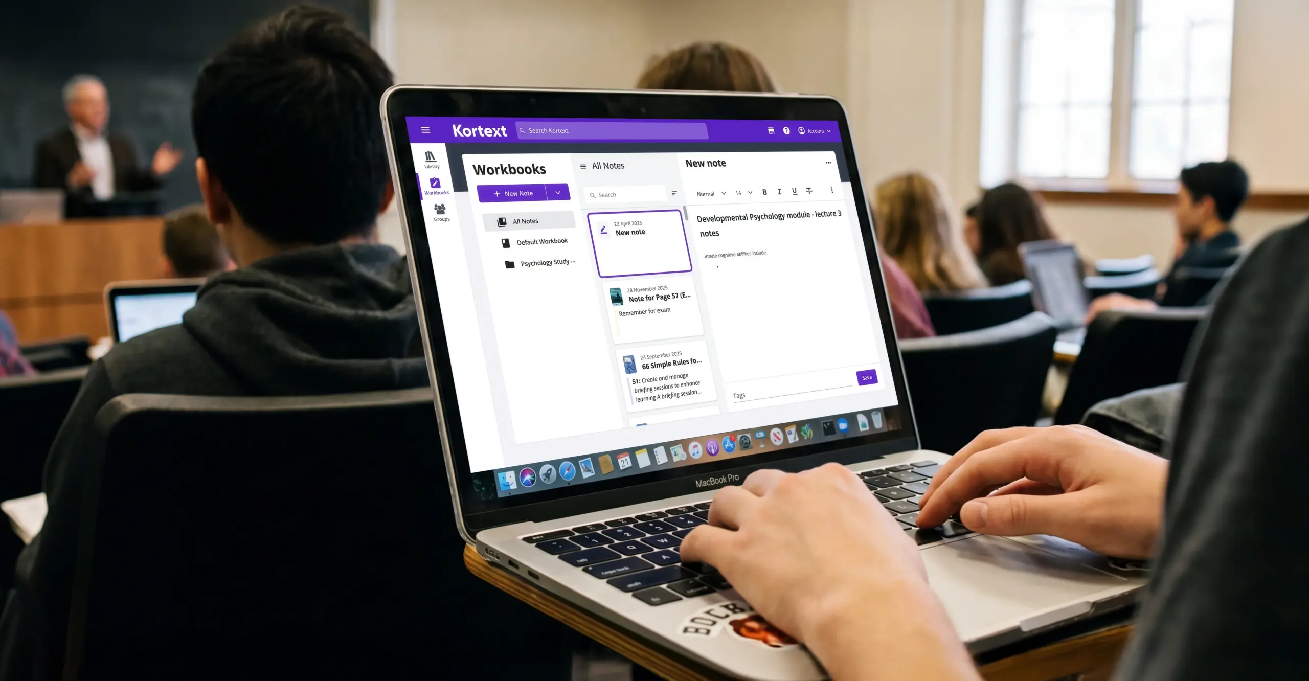 A student makes notes during a lecture, using the workbooks feature in Kortext